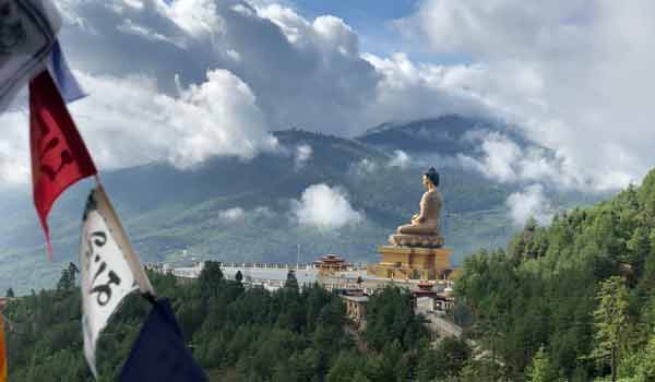 The Statue of Buddha, main highlight of honeymoon tour in Bhutan.