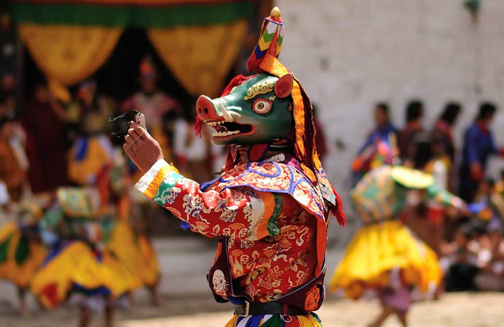 The masked dance at Chhukha tshechu festival in Bhutan