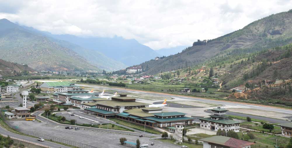How to book flights to Bhutan from Rome, Italy to Paro airport?