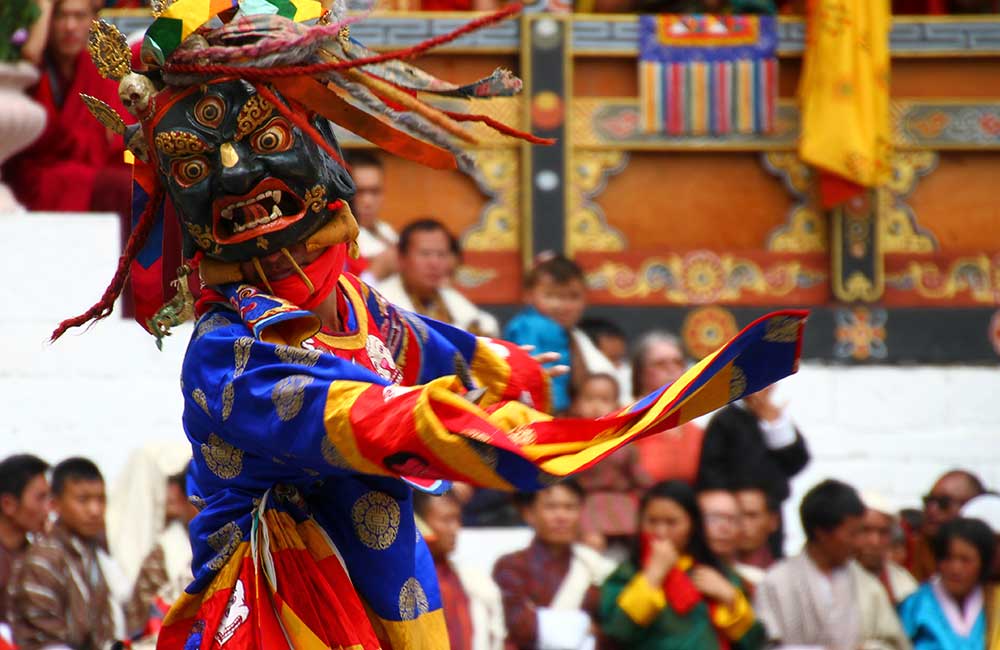 Masked dance at Jambay lhakhang Singye Cham.