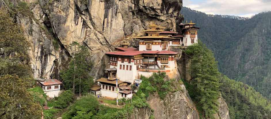 Tiger's Nest monastery, highlight of travel to Bhutan from Madrid, Spain / Lisbon, Portugal