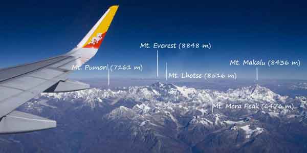 The view of Mt. Everest from Drukair flight, highlight of flights to Bhutan from Vienna, Austria.